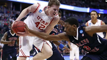 Mar 17, 2016; Denver , CO, USA; Fresno State Bulldogs guard Paul Watson (3) strips the ball from Utah Utes forward Jakob Poeltl (42) in the second half of Utah vs Fresno State in the first round of the 2016 NCAA Tournament at Pepsi Center. Mandatory Credit: Isaiah J. Downing-USA TODAY Sports