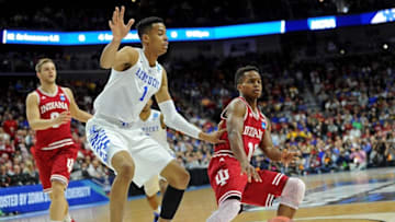 Mar 19, 2016; Des Moines, IA, USA; Indiana Hoosiers guard Yogi Ferrell (11) passes the ball against Kentucky Wildcats forward Skal Labissiere (1) in the first half during the second round of the 2016 NCAA Tournament at Wells Fargo Arena. Mandatory Credit: Steven Branscombe-USA TODAY Sports