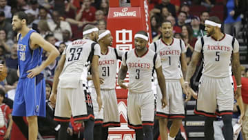 Jan 24, 2016; Houston, TX, USA; Houston Rockets guard Ty Lawson (3) celebrates his basket with teammates against the Dallas Mavericks in the second half at Toyota Center. Rockets won 115 to 104. Mandatory Credit: Thomas B. Shea-USA TODAY Sports