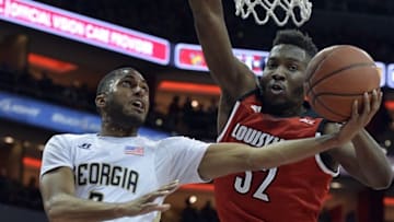 Mar 1, 2016; Louisville, KY, USA; Georgia Tech Yellow Jackets guard Adam Smith (2) shoots against Louisville Cardinals center Chinanu Onuaku (32) during the first half at KFC Yum! Center. Mandatory Credit: Jamie Rhodes-USA TODAY Sports