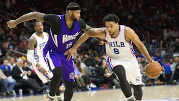Feb 10, 2016; Philadelphia, PA, USA; Philadelphia 76ers center Jahlil Okafor (8) dribbles against Sacramento Kings center DeMarcus Cousins (15) during the second half at Wells Fargo Center. The Sacramento Kings won 114-110. Mandatory Credit: Bill Streicher-USA TODAY Sports