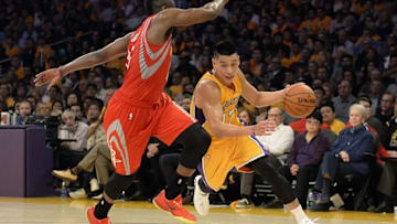 Oct 28, 2014; Los Angeles, CA, USA; Los Angeles Lakers guard Jeremy Lin (17) drives against Houston Rockets guard James Harden (13) during the second half at Staples Center. Mandatory Credit: Richard Mackson-USA TODAY Sports
