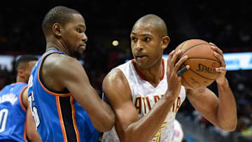 Nov 30, 2015; Atlanta, GA, USA; Oklahoma City Thunder forward Kevin Durant (35) guards Atlanta Hawks center Al Horford (15) during the second half at Philips Arena. The Hawks defeated the Thunder 106-100. Mandatory Credit: Dale Zanine-USA TODAY Sports