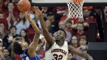 Feb 20, 2016; Louisville, KY, USA; Duke Blue Devils guard Brandon Ingram (14) shoots the ball as Louisville Cardinals center Chinanu Onuaku (32) defends during the second half at KFC Yum! Center. The Cardinals won 71-64. Mandatory Credit: Jamie Rhodes-USA TODAY Sports