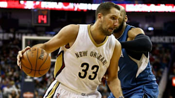 Feb 27, 2016; New Orleans, LA, USA; New Orleans Pelicans forward Ryan Anderson (33) moves past Minnesota Timberwolves forward Adreian Payne (33) during the second half of a game at the Smoothie King Center. The Timberwolves defeated the Pelicans 112-110. Mandatory Credit: Derick E. Hingle-USA TODAY Sports