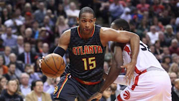 Mar 10, 2016; Toronto, Ontario, CAN; Atlanta Hawks forward Al Horford (15) goes to the basket against the Toronto Raptors at Air Canada Centre. The Raptors beat the Hawks 104-96. Mandatory Credit: Tom Szczerbowski-USA TODAY Sports