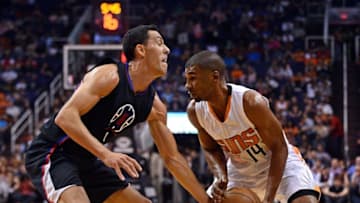 Apr 13, 2016; Phoenix, AZ, USA; Los Angeles Clippers guard Pablo Prigioni (9) guards Phoenix Suns guard Ronnie Price (14) during the first half at Talking Stick Resort Arena. Mandatory Credit: Joe Camporeale-USA TODAY Sports