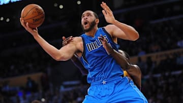 January 26, 2016; Los Angeles, CA, USA; Dallas Mavericks center JaVale McGee (11) moves to the basket against Los Angeles Lakers center Roy Hibbert (17) during the first half at Staples Center. Mandatory Credit: Gary A. Vasquez-USA TODAY Sports