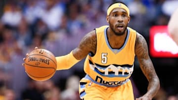 Apr 10, 2016; Denver, CO, USA; Denver Nuggets forward Will Barton (5) dribbles the ball in the fourth quarter against the Utah Jazz at the Pepsi Center. Mandatory Credit: Isaiah J. Downing-USA TODAY Sports