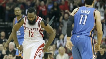 Nov 2, 2015; Houston, TX, USA; Houston Rockets guard James Harden (13) reacts after making a three point basket against the Oklahoma City Thunder in the fourth quarter at Toyota Center. Rocket won 110 to 105. Mandatory Credit: Thomas B. Shea-USA TODAY Sports