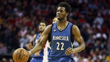 Mar 18, 2016; Houston, TX, USA; Minnesota Timberwolves guard Andrew Wiggins (22) dribbles the ball during the fourth quarter against the Houston Rockets at Toyota Center. The Rockets won 116-111. Mandatory Credit: Troy Taormina-USA TODAY Sports
