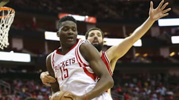 Mar 31, 2016; Houston, TX, USA; Houston Rockets forward Clint Capela (15) and Chicago Bulls forward Nikola Mirotic (44) battle for a loose ball during the second quarter at Toyota Center. Mandatory Credit: Troy Taormina-USA TODAY Sports