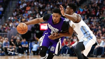 Apr 2, 2016; Denver, CO, USA; Sacramento Kings forward Rudy Gay (8) drives to the net against Denver Nuggets guard Emmanuel Mudiay (0) in the fourth quarter at the Pepsi Center. The Kings defeated the Nuggets 115-106. Mandatory Credit: Isaiah J. Downing-USA TODAY Sports