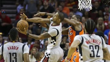 Apr 3, 2016; Houston, TX, USA; Houston Rockets forward Trevor Ariza (1) attempts to score as Oklahoma City Thunder forward Kevin Durant (35) defends during the second half at Toyota Center. The Rockets won 118-110. Mandatory Credit: Troy Taormina-USA TODAY Sports