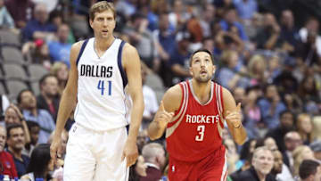 Oct 19, 2016; Dallas, TX, USA; Houston Rockets forward Ryan Anderson (3) reacts in front of Dallas Mavericks forward Dirk Nowitzki (41) after scoring during the first quarter at American Airlines Center. Mandatory Credit: Kevin Jairaj-USA TODAY Sports