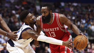 Oct 19, 2016; Dallas, TX, USA; Houston Rockets guard James Harden (13) dribbles as Dallas Mavericks guard Wesley Matthews (left) defends during the second half at American Airlines Center. Mandatory Credit: Kevin Jairaj-USA TODAY Sports