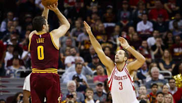 Nov 1, 2016; Cleveland, OH, USA; Cleveland Cavaliers forward Kevin Love (0) shoots over Houston Rockets forward Ryan Anderson (3) in the first half at Quicken Loans Arena. Mandatory Credit: Rick Osentoski-USA TODAY Sports