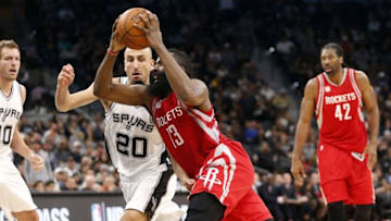 Nov 9, 2016; San Antonio, TX, USA; Houston Rockets shooting guard James Harden (13) drives to the basket while guarded by San Antonio Spurs shooting guard Manu Ginobili (20) during the second half at AT&T Center. Mandatory Credit: Soobum Im-USA TODAY Sports