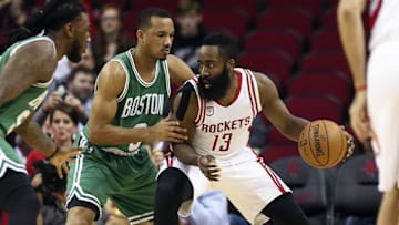 Dec 5, 2016; Houston, TX, USA; Houston Rockets guard James Harden (13) controls the ball as Boston Celtics guard Avery Bradley (0) defends during the first quarter at Toyota Center. Mandatory Credit: Troy Taormina-USA TODAY Sports