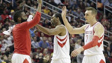 Dec 7, 2016; Houston, TX, USA; Houston Rockets guard James Harden (13) celebrates with forward Sam Dekker (7) during Los Angeles Lakers time out in the second half at Toyota Center. The Houston Rockets won 134 to 95. Mandatory Credit: Thomas B. Shea-USA TODAY Sports