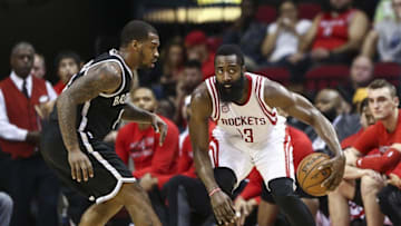 Dec 12, 2016; Houston, TX, USA; Houston Rockets guard James Harden (13) dribbles the ball as Brooklyn Nets guard Sean Kilpatrick (6) defends during the third quarter at Toyota Center. Mandatory Credit: Troy Taormina-USA TODAY Sports
