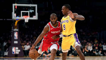 Chris Paul #3 of the Houston Rockets drives on Rajon Rondo #9 of the Los Angeles Lakers (Photo by Harry How/Getty Images)