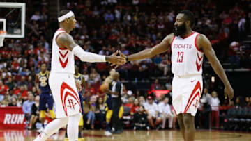 HOUSTON, TX - OCTOBER 04: James Harden #13 of the Houston Rockets shakes hands with Carmelo Anthony #7 against the Indiana Pacers at Toyota Center on October 4, 2018 in Houston, Texas. NOTE TO USER: User expressly acknowledges and agrees that, by downloading and or using this photograph, User is consenting to the terms and conditions of the Getty Images License Agreement. (Photo by Bob Levey/Getty Images)