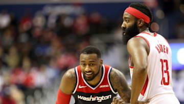 John Wall #2 of the Washington Wizards talks with James Harden #13 of the Houston Rockets (Photo by Rob Carr/Getty Images)