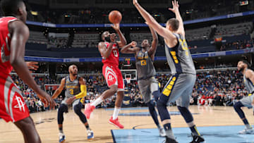 MEMPHIS, TN - DECEMBER 15: James Harden #13 of the Houston Rockets passes the ball against the Memphis Grizzlies on December 15, 2018 at FedExForum in Memphis, Tennessee. NOTE TO USER: User expressly acknowledges and agrees that, by downloading and or using this photograph, User is consenting to the terms and conditions of the Getty Images License Agreement. Mandatory Copyright Notice: Copyright 2018 NBAE (Photo by Joe Murphy/NBAE via Getty Images)