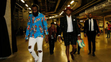 MIAMI, FL - DECEMBER 20: James Harden #13 and PJ Tucker #17 of the Houston Rockets arrive prior to the game between the Miami Heat and the Houston Rockets at American Airlines Arena on December 20, 2018 in Miami, Florida. NOTE TO USER: User expressly acknowledges and agrees that, by downloading and or using this photograph, User is consenting to the terms and conditions of the Getty Images License Agreement. (Photo by Michael Reaves/Getty Images)