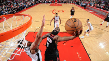 HOUSTON, TX - DECEMBER 22: James Harden #13 of the Houston Rockets goes to the basket against the San Antonio Spurs on December 22, 2018 at the Toyota Center in Houston, Texas. NOTE TO USER: User expressly acknowledges and agrees that, by downloading and/or using this photograph, user is consenting to the terms and conditions of the Getty Images License Agreement. Mandatory Copyright Notice: Copyright 2018 NBAE (Photo by Bill Baptist/NBAE via Getty Images)
