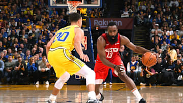 James Harden #13 of the Houston Rockets handles the ball against the Golden State Warriors (Photo by Noah Graham/NBAE via Getty Images)