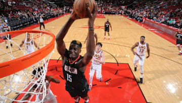 Clint Cappella #15 of the Houston Rockets dunks against the Cleveland Cavaliers (Photo by Bill Baptist/NBAE via Getty Images)