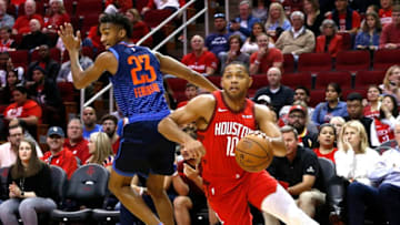 HOUSTON, TEXAS - DECEMBER 25: Eric Gordon #10 of the Houston Rockets drives around Terrance Ferguson #23 of the Oklahoma City Thunder during the first quarter at Toyota Center on December 25, 2018 in Houston, Texas. NOTE TO USER: User expressly acknowledges and agrees that, by downloading and or using this photograph, User is consenting to the terms and conditions of the Getty Images License Agreement. (Photo by Bob Levey/Getty Images)