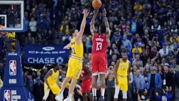 OAKLAND, CA - JANUARY 03: James Harden #13 of the Houston Rockets shoots over Klay Thompson #11 of the Golden State Warriors during an NBA basketball game at ORACLE Arena on January 3, 2019 in Oakland, California. NOTE TO USER: User expressly acknowledges and agrees that, by downloading and or using this photograph, User is consenting to the terms and conditions of the Getty Images License Agreement. (Photo by Thearon W. Henderson/Getty Images)
