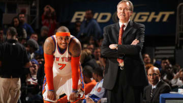 NEW YORK, NY - APRIL 12: Carmelo Anthony #7 of the New York Knicks and head coach Mike D'Antoni share a laugh during a break in the action against the Chicago Bulls on April 12, 2011 at Madison Square Garden in New York City. NOTE TO USER: User expressly acknowledges and agrees that, by downloading and or using this photograph, User is consenting to the terms and conditions of the Getty Images License Agreement. Mandatory Copyright Notice: Copyright 2011 NBAE (Photo by Nathaniel S. Butler/NBAE via Getty Images)