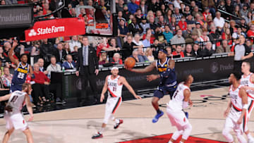 PORTLAND, OR - APRIL 7: Torrey Craig #3 of the Denver Nuggets shoots the ball against the Portland Trail Blazers on April 7, 2019 at the Moda Center Arena in Portland, Oregon. NOTE TO USER: User expressly acknowledges and agrees that, by downloading and or using this photograph, user is consenting to the terms and conditions of the Getty Images License Agreement. Mandatory Copyright Notice: Copyright 2019 NBAE (Photo by Sam Forencich/NBAE via Getty Images)