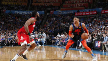 Russell Westbrook #0 of the Oklahoma City Thunder handles the ball during the game against James Harden #13 of the Houston Rockets (Photo by Jeff Haynes/NBAE via Getty Images)