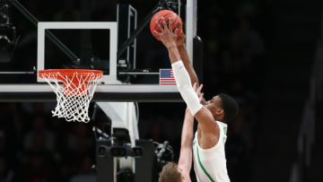 SAN JOSE, CALIFORNIA - MARCH 24: Kenny Wooten #14 of the Oregon Ducks dunks against Tommy Rutherford #42 of the UC Irvine Anteaters in the first half during the second round of the 2019 NCAA Men's Basketball Tournament at SAP Center on March 24, 2019 in San Jose, California. (Photo by Ezra Shaw/Getty Images)