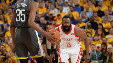 OAKLAND, CA - APRIL 30: James Harden #13 of the Houston Rockets looks on during Game Two of the Western Conference Semifinals of the 2019 NBA Playoffs against the Golden State Warriors on April 30, 2019 at ORACLE Arena in Oakland, California. NOTE TO USER: User expressly acknowledges and agrees that, by downloading and or using this photograph, user is consenting to the terms and conditions of Getty Images License Agreement. Mandatory Copyright Notice: Copyright 2019 NBAE (Photo by Noah Graham/NBAE via Getty Images)