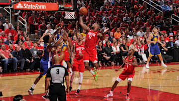 PJ Tucker #17 of the Houston Rockets grabs the rebound against the Golden State Warriors (Photo by Bill Baptist/NBAE via Getty Images)