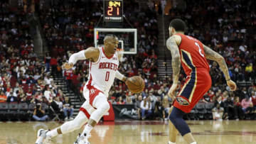 Russell Westbrook #0 of the Houston Rockets drives to the basket defended by Lonzo Ball #2 of the New Orleans Pelicans (Photo by Tim Warner/Getty Images)