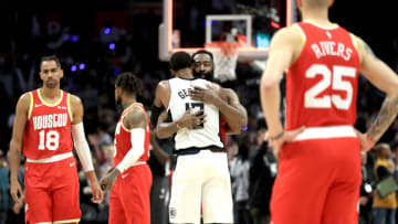 Paul George #13 of the Los Angeles Clippers is congratulated by James Harden #13 of the Houston Rockets (Photo by Sean M. Haffey/Getty Images)
