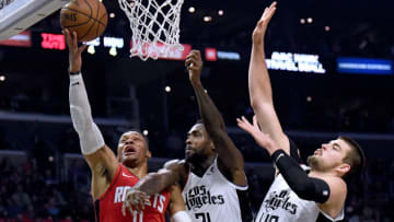 Russell Westbrook #0 of the Houston Rockets is fouled by Patrick Beverley #21 of the LA Clippers (Photo by Harry How/Getty Images)