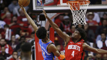Shai Gilgeous-Alexander Danuel House (Photo by Bob Levey/Getty Images)