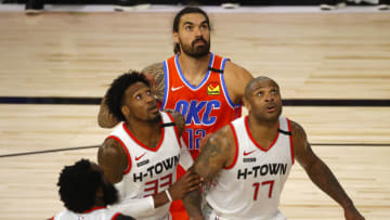 James Harden #13, Robert Covington #33 and P.J. Tucker #17 of the Houston Rockets (Photo by Mike Ehrmann/Getty Images)