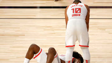 LAKE BUENA VISTA, FLORIDA - AUGUST 22: Eric Gordon #10 stands over James Harden #13 of the Houston Rockets against the Oklahoma City Thunder during the third quarter in Game Three of the Western Conference First Round during the 2020 NBA Playoffs at The Field House at ESPN Wide World Of Sports Complex on August 22, 2020 in Lake Buena Vista, Florida. NOTE TO USER: User expressly acknowledges and agrees that, by downloading and or using this photograph, User is consenting to the terms and conditions of the Getty Images License Agreement. (Photo by Mike Ehrmann/Getty Images)