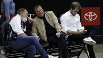 Houston Rockets owner Tilman Fertitta, center, team president Tad Brown, left and Patrick Fertitta (Photo by Bob Levey/Getty Images)