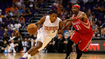 PHOENIX, AZ - OCTOBER 13: Brandon Knight #3 of the Phoenix Suns drives the ball past Jason Terry #31 of the Houston Rockets during the preseason NBA game at Talking Stick Resort Arena on October 13, 2015 in Phoenix, Arizona. NOTE TO USER: User expressly acknowledges and agrees that, by downloading and or using this photograph, User is consenting to the terms and conditions of the Getty Images License Agreement. (Photo by Christian Petersen/Getty Images)