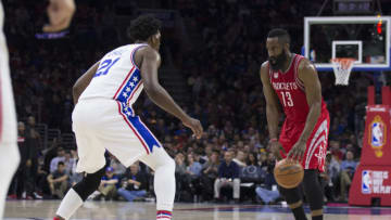 PHILADELPHIA, PA - JANUARY 27: James Harden #13 of the Houston Rockets dribbles the ball against Joel Embiid #21 of the Philadelphia 76ers in the third quarter at the Wells Fargo Center on January 27, 2017 in Philadelphia, Pennsylvania. The Rockets defeated the 76ers 123-118. NOTE TO USER: User expressly acknowledges and agrees that, by downloading and or using this photograph, User is consenting to the terms and conditions of the Getty Images License Agreement. (Photo by Mitchell Leff/Getty Images)